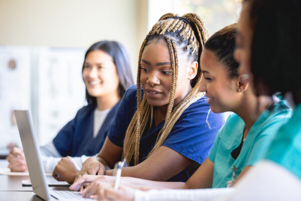 Diverse group of women are nursing or medical students at local university