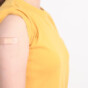 Adult Woman with bandage after received vaccine. Vaccination and Immunization for Influenza, HPV, Zoster, IPD, DTP or Diphtheria, Tetanus and Pertussis, MMR, Hepatitis B, Covid and Varicella vaccine